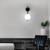 Wandleuchte für das Schlafzimmer aus Metall und Glas-Leuchtezauber