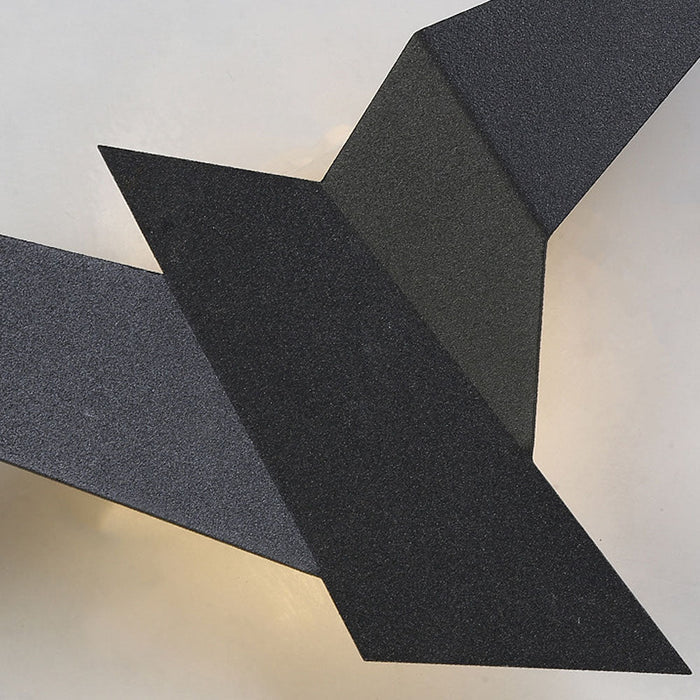 Kreative Wandleuchte aus Eisen in Vogelform-Leuchtezauber