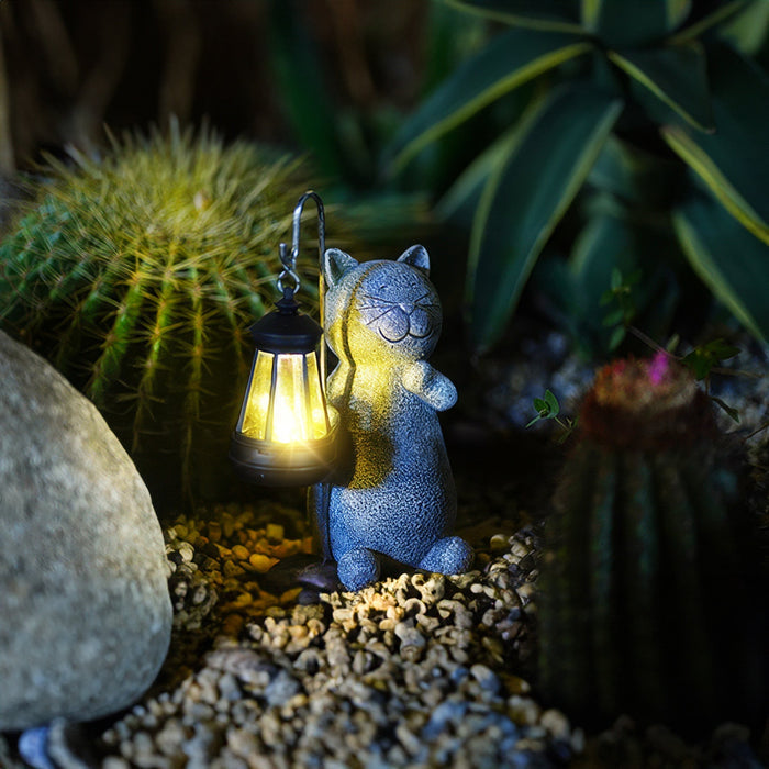 Golden leuchtende Katzengartenlampe-Leuchtezauber