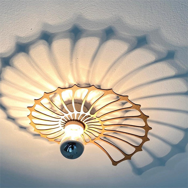 Dekorative Wandleuchte im Nautilus-Muschel-Design-Leuchtezauber