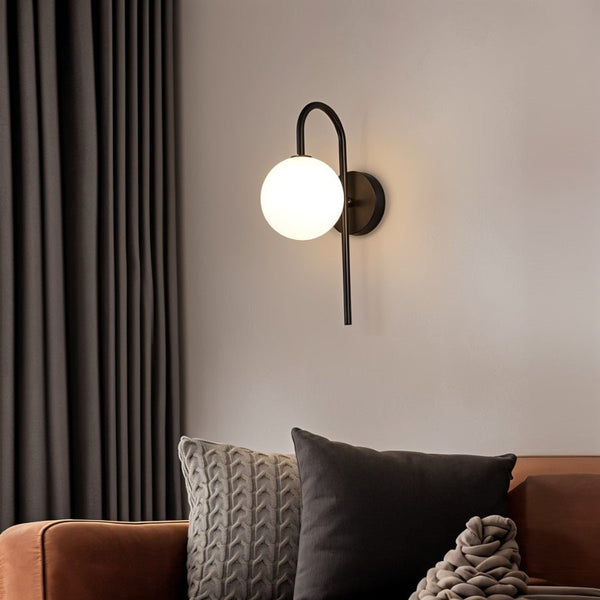 Wandleuchte für das Schlafzimmer aus Metall und Glas-Leuchtezauber