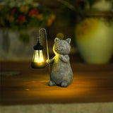 Golden leuchtende Katzengartenlampe-Leuchtezauber